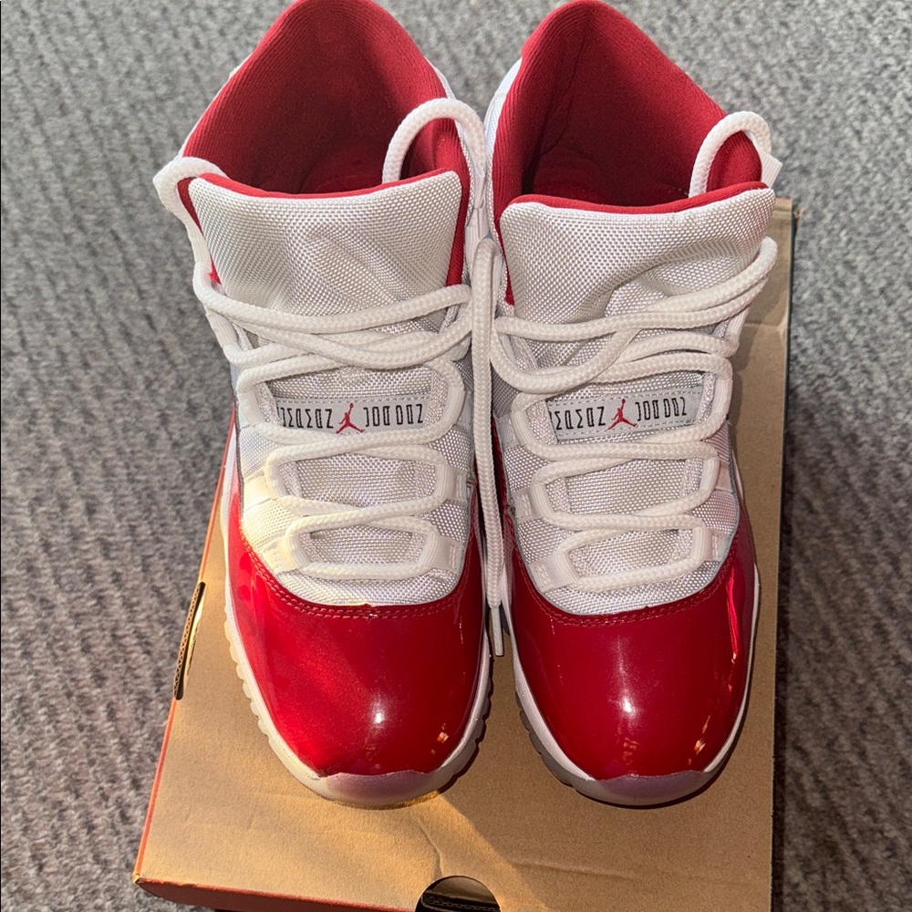 Jordan Cherry Red 11s High-Top Red and White Sneakers - Picture 2 of 9
